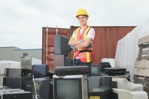 Workers assessing hazards during a garden clearance site survey